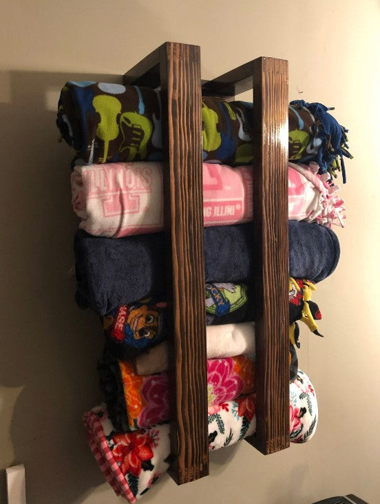 Wall mounted blanket rack